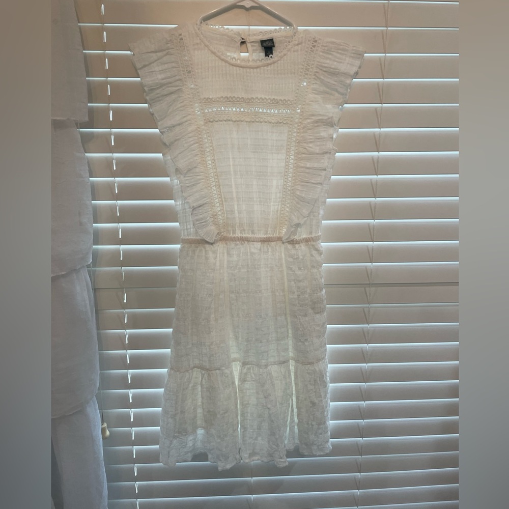 white dress with detailing